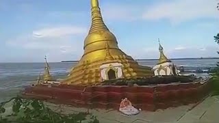 Buddhist pagoda falls into river in Myanmar [upl. by Egamlat]