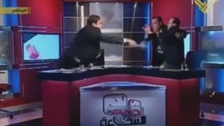 Fight breaks out on live TV in Lebanon during Syria debate [upl. by Kreiner]