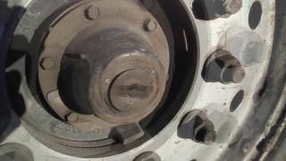 How To Check Hub Bearing Oil Level On Semi Truck [upl. by Yattirb]